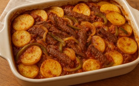  طريقة عمل صينية البطاطس باللحمة الشرائح